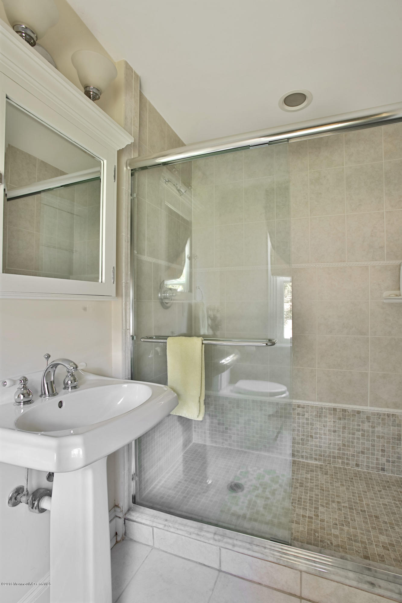 7 Partridge Way Colts Neck, NJ 07722 - Photo 30 of 50 a bathroom with a sink and a mirror