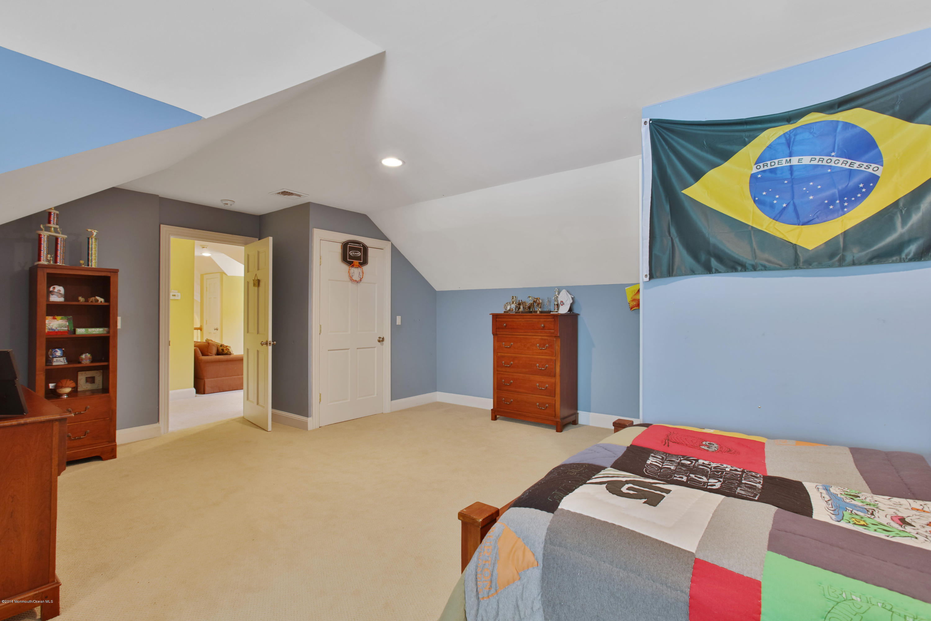 7 Partridge Way Colts Neck, NJ 07722 - Photo 34 of 50 a bedroom with a bed and a painting on the wall