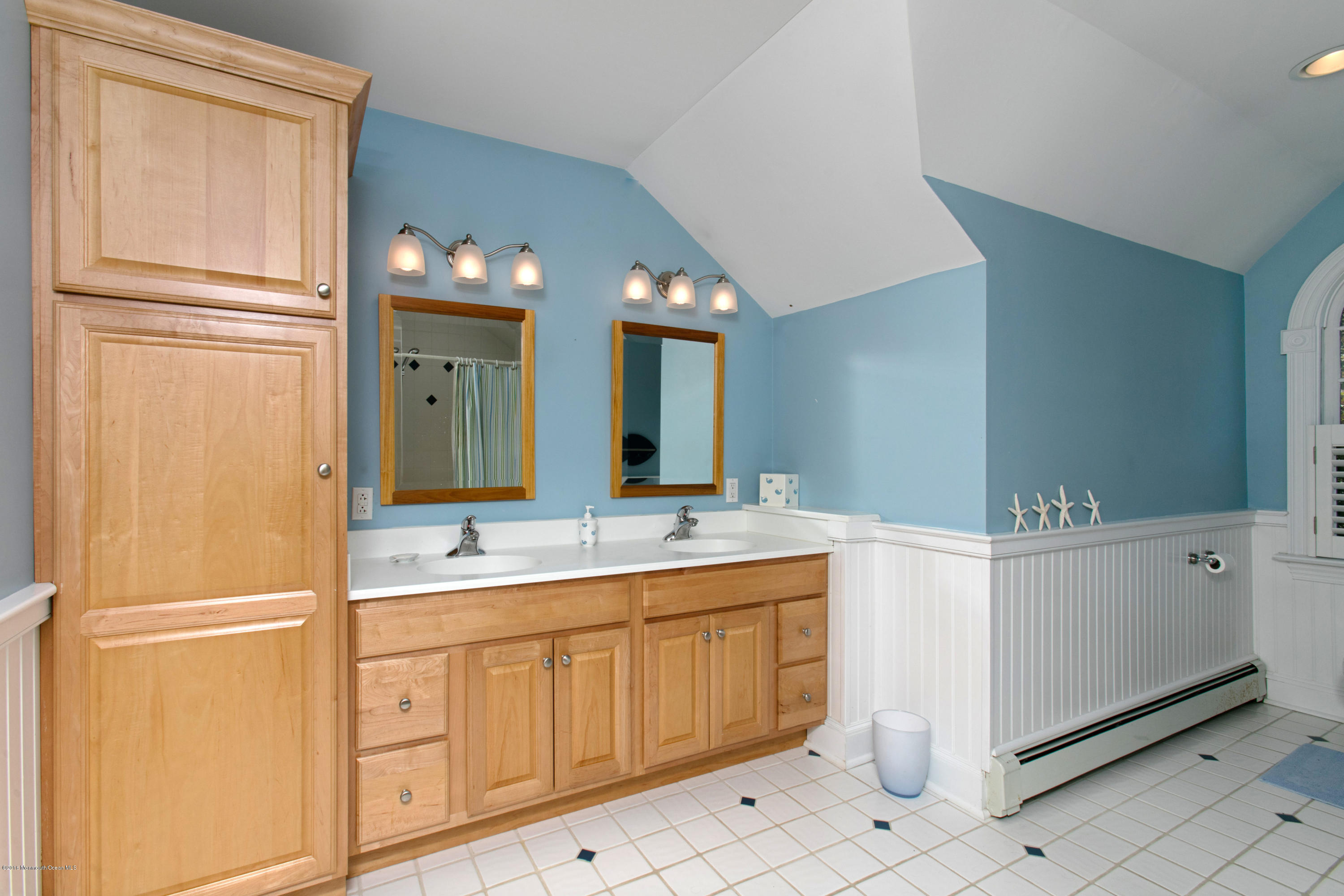 7 Partridge Way Colts Neck, NJ 07722 - Photo 35 of 50 a bathroom with a double vanity sink and mirror