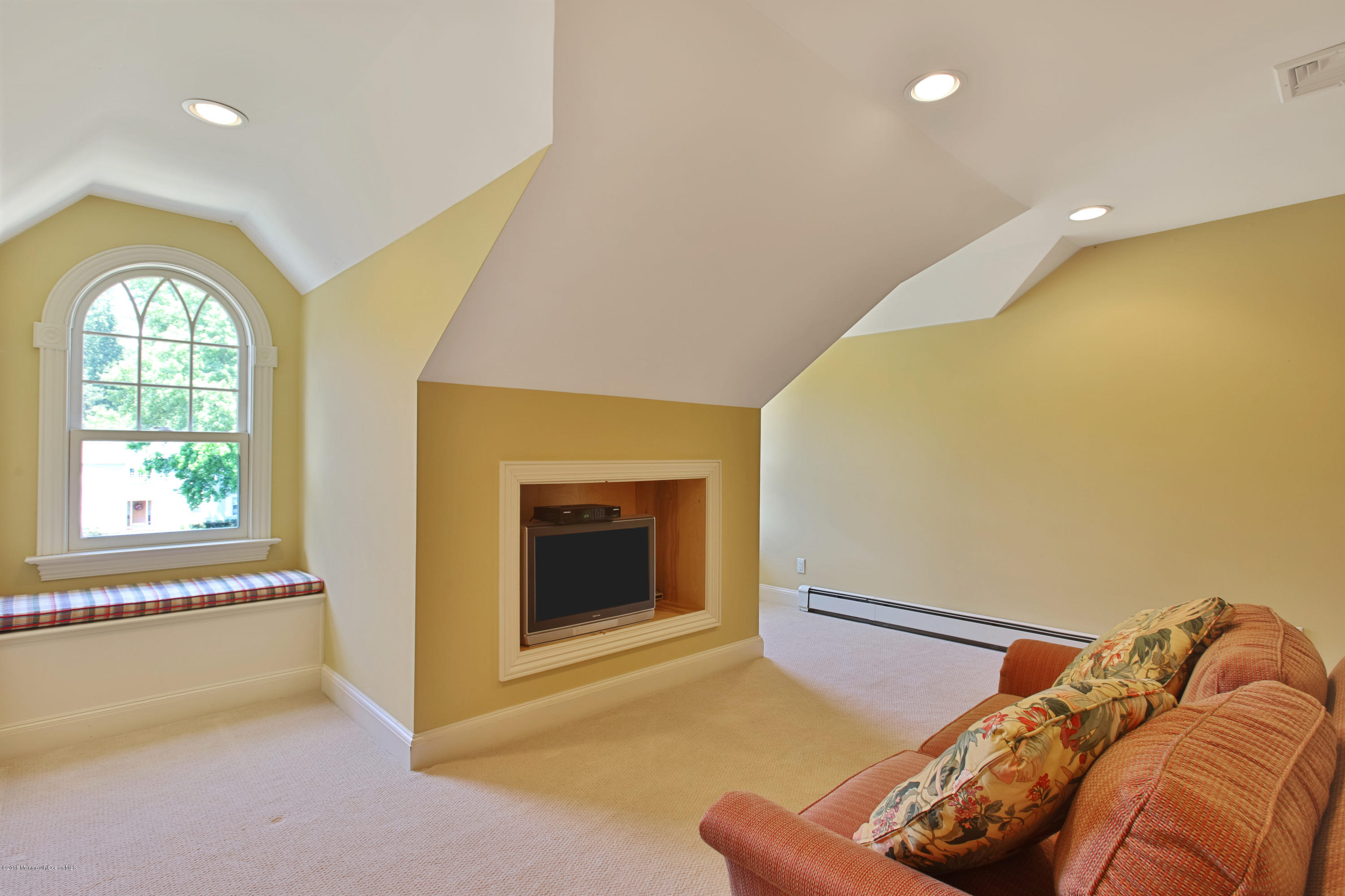 7 Partridge Way Colts Neck, NJ 07722 - Photo 38 of 50 a living room with furniture and a floor to ceiling window