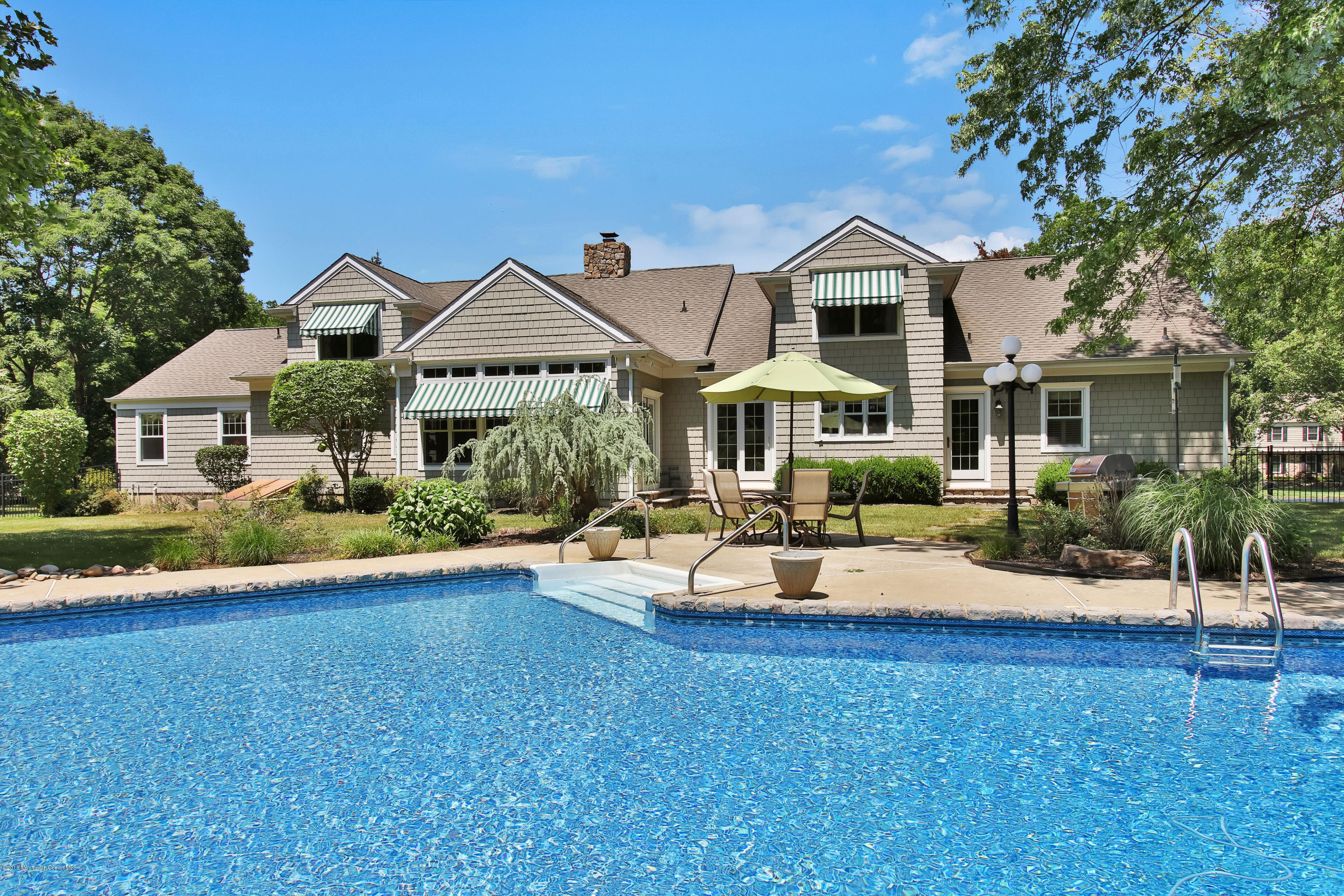 7 Partridge Way Colts Neck, NJ 07722 - Photo 43 of 50 a front view of house with yard and green space