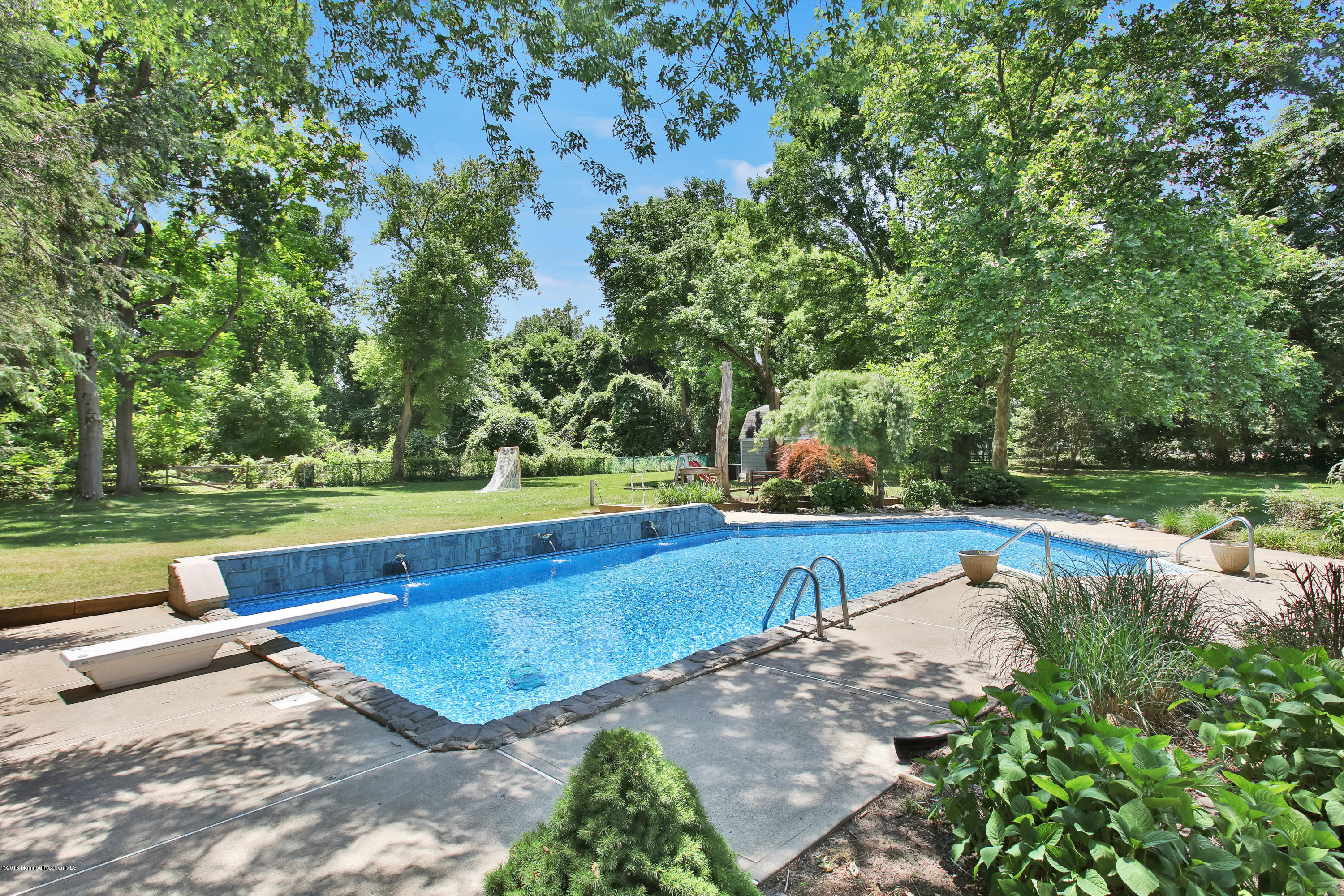 7 Partridge Way Colts Neck, NJ 07722 - Photo 45 of 50 a view of a yard with large trees