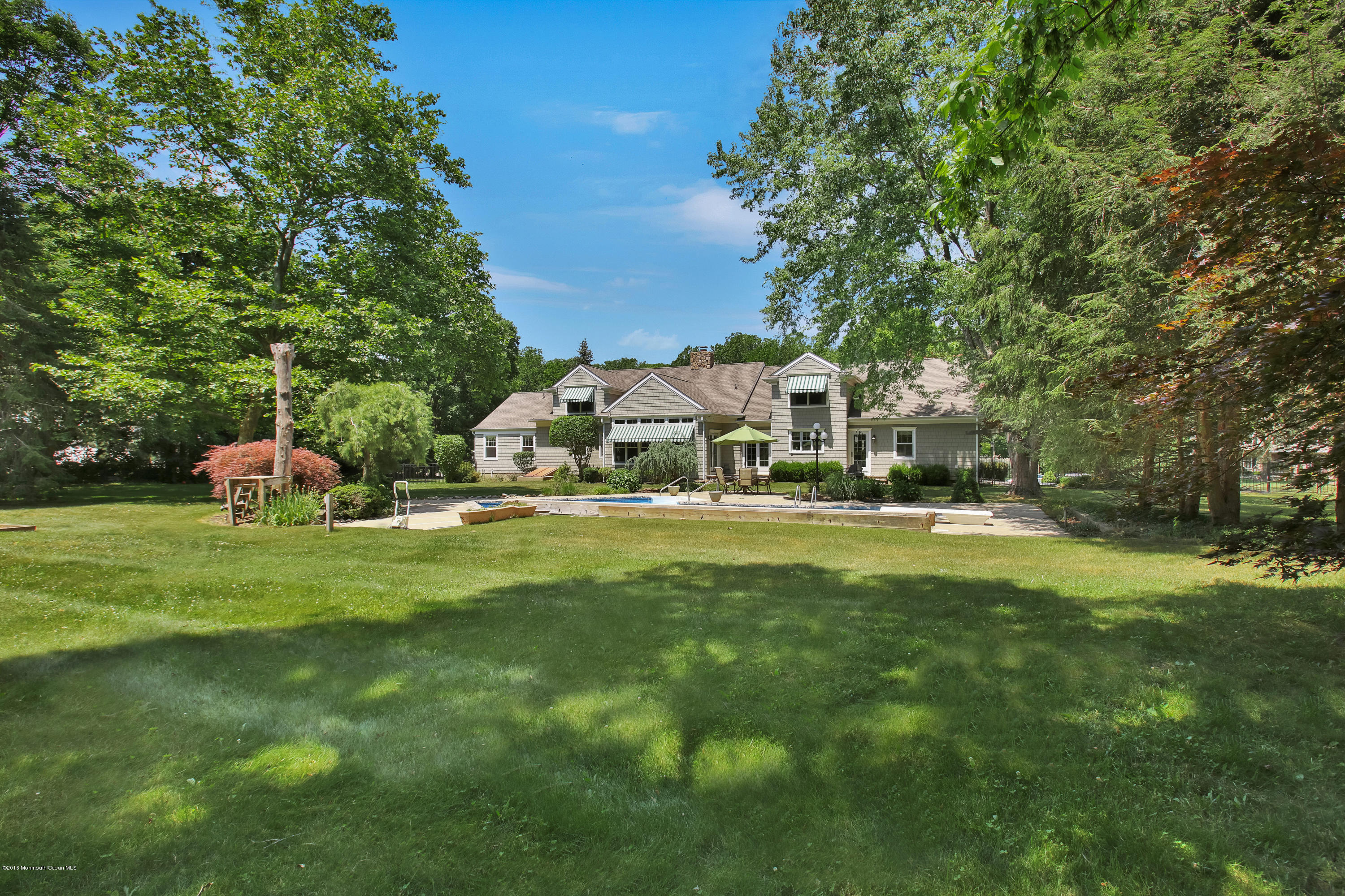 7 Partridge Way Colts Neck, NJ 07722 - Photo 47 of 50 a front view of a house with garden