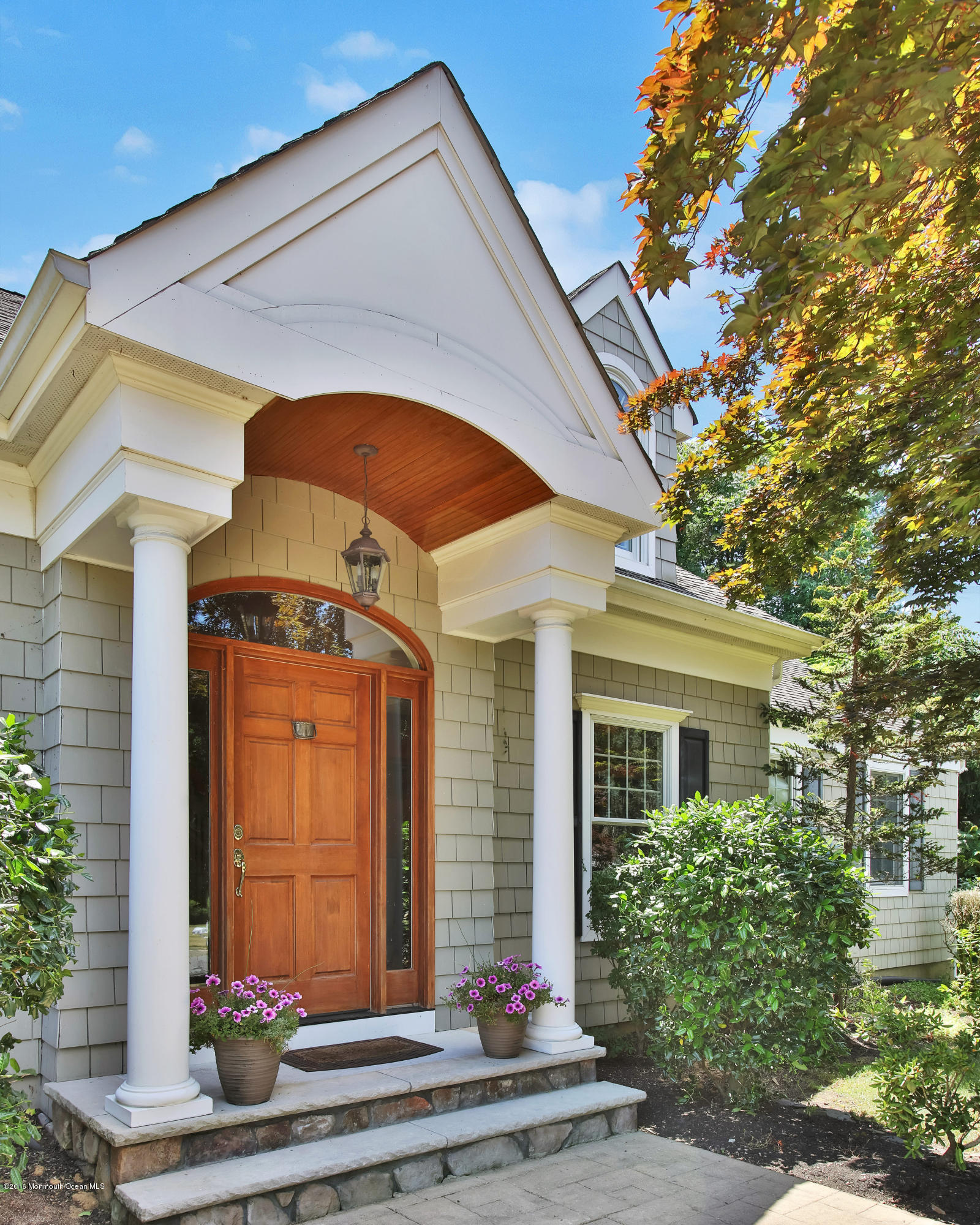 7 Partridge Way Colts Neck, NJ 07722 - Photo 6 of 50 a front view of a house with a yard