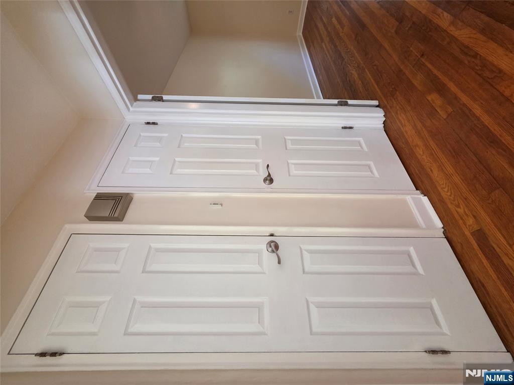 245 Johnson Avenue, Unit K1 Hackensack, NJ 07601 - Photo 10 of 15 a view of empty room with wooden floor