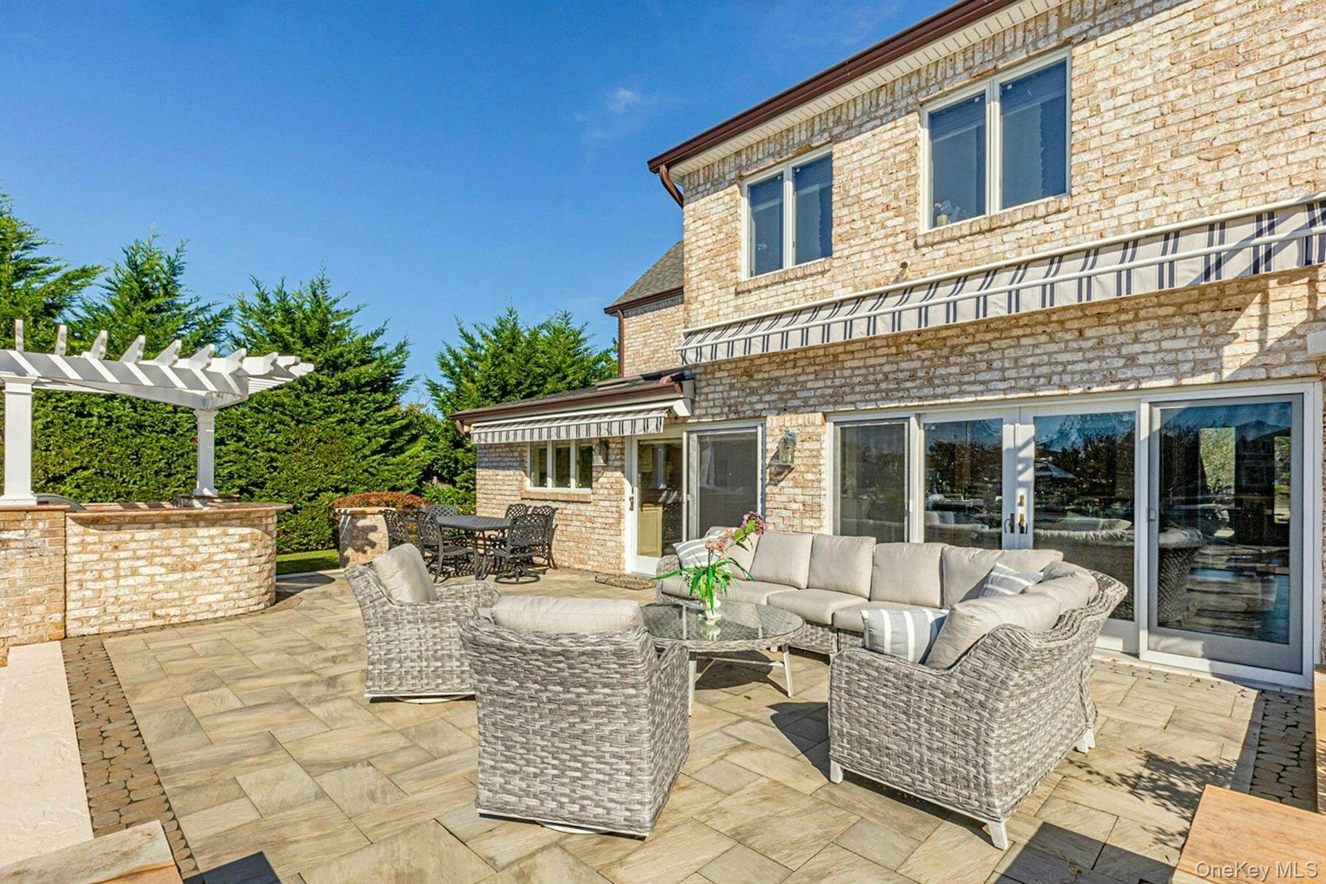 10 Beech Road Islip, NY 11751 - Photo 44 of 49 We love the seating area and the 2 awnings for shade.