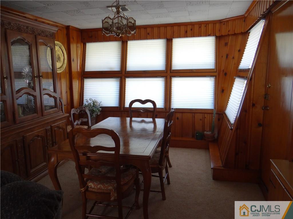 2 Roger Road Edison, NJ 08817 - Photo 11 of 16 a view of a dining room with furniture and window