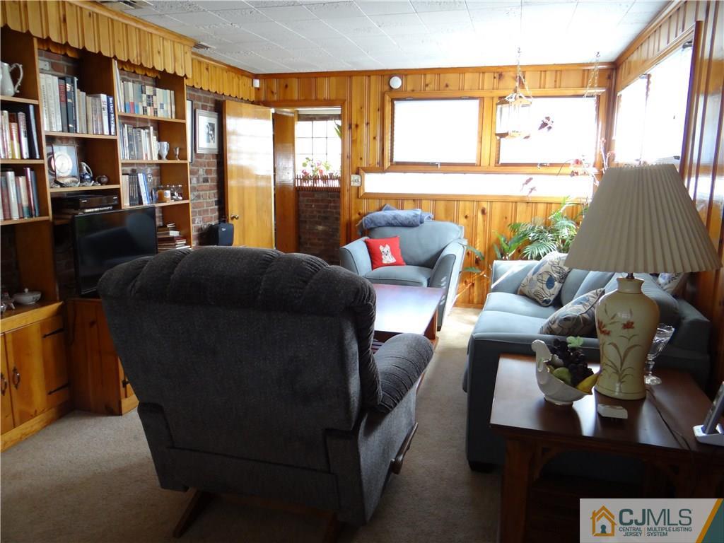 2 Roger Road Edison, NJ 08817 - Photo 12 of 16 a living room with furniture and a window