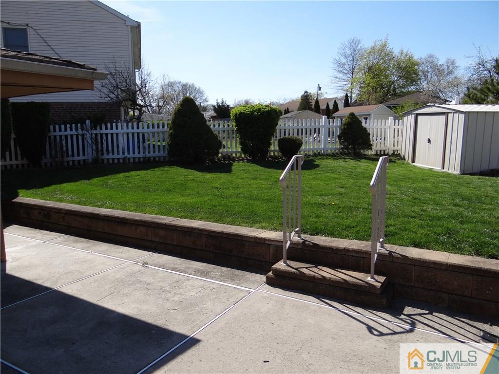 2 Roger Road Edison, NJ 08817 - Photo 5 of 16 a park view with a bench