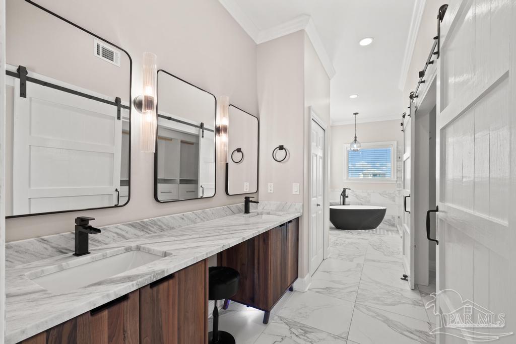 321 Gulfview Lane Perdido Key, FL 32507 - Photo 23 of 57 a large bathroom with a granite countertop sink mirror and shower