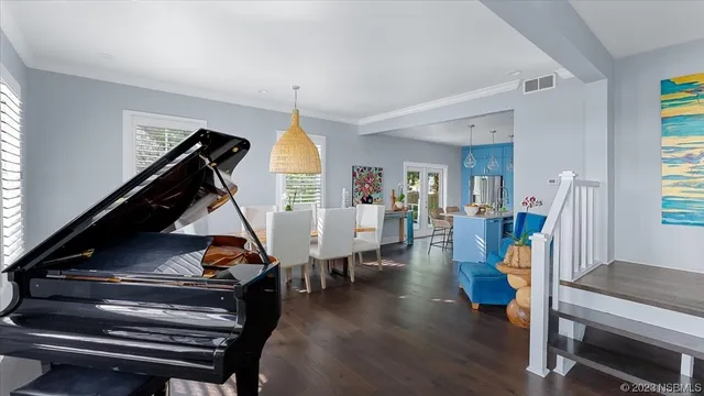 a kitchen with stainless steel appliances granite countertop a refrigerator stove and sink