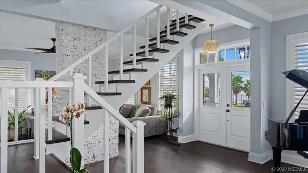 a bathroom with a toilet a sink and a mirror
