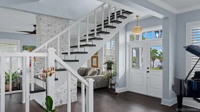 a bathroom with a toilet a sink and a mirror