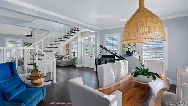 a view of livingroom with furniture and staircase