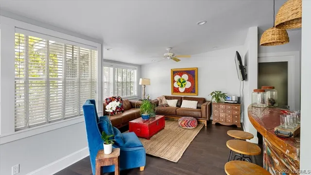 a kitchen with stainless steel appliances granite countertop a refrigerator stove and microwave