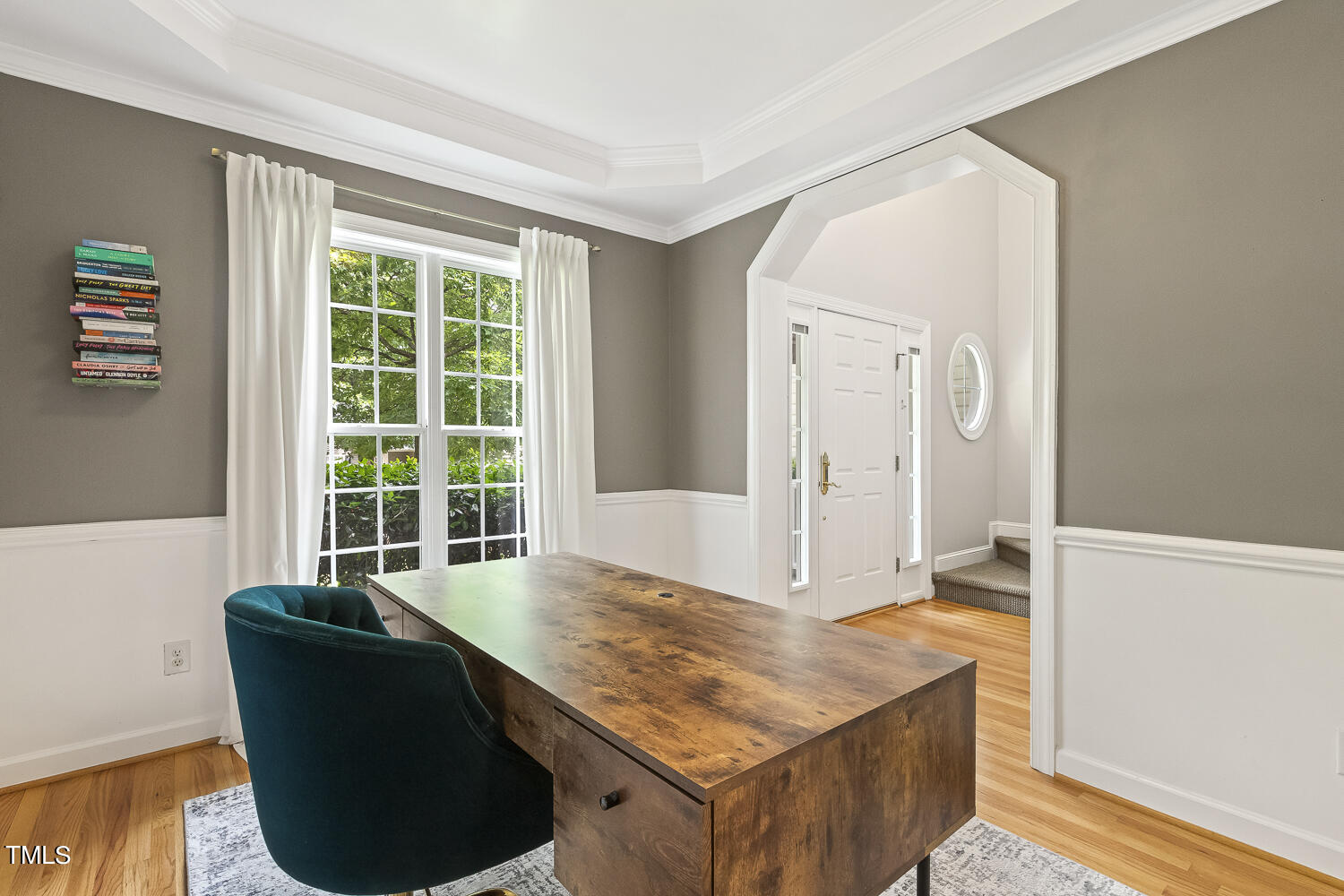 6409 Nowell Pointe Drive Raleigh, NC 27607 - Photo 5 of 29 a living room with hard wood floor and a window