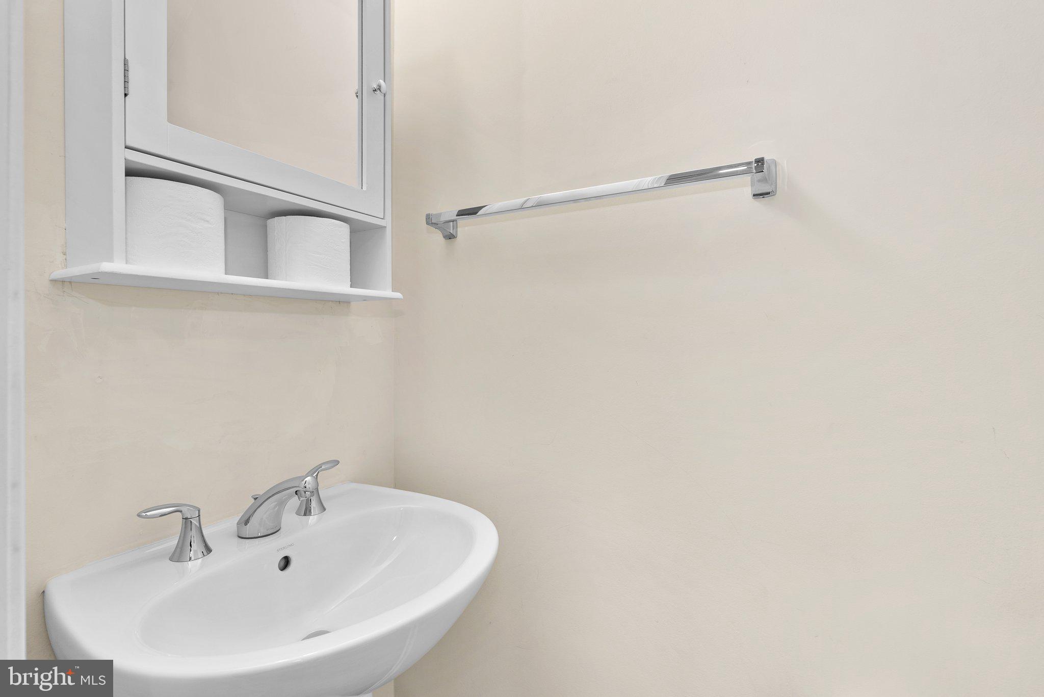 2734 Duvall Ridge Road Hyattsville, MD 20785 - Photo 9 of 31 Half bathroom on the main level.