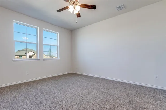 an empty room with a empty space and window