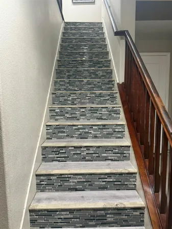 a view of a kitchen from the hallway