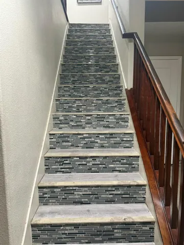 a view of a kitchen from the hallway
