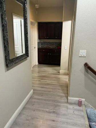 a view of living room with furniture and a window