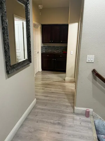 a view of living room with furniture and a window
