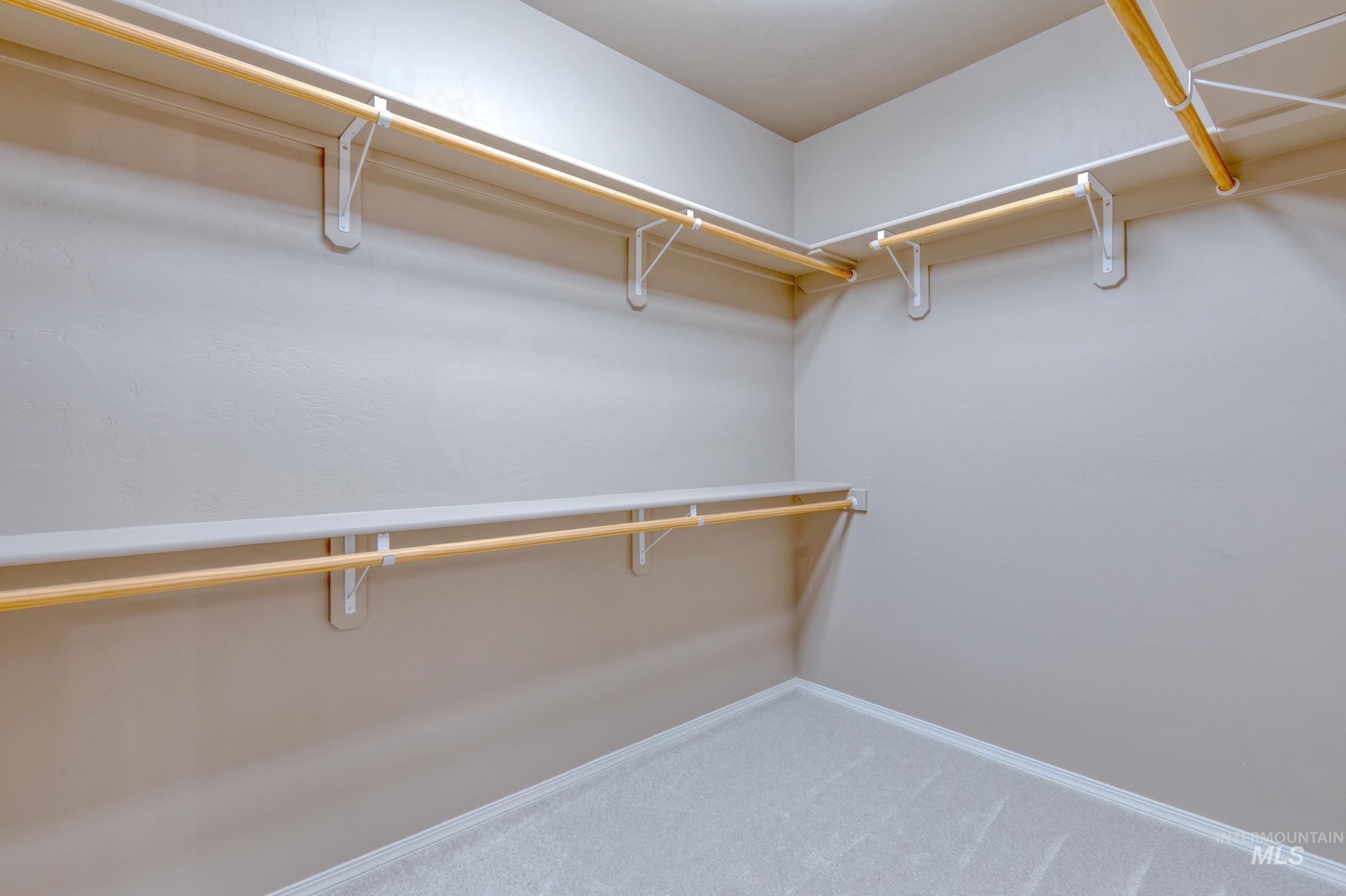 12734 Amber Sky Drive Caldwell, ID 83607 - Photo 15 of 28 Walk in closet featuring light colored carpet