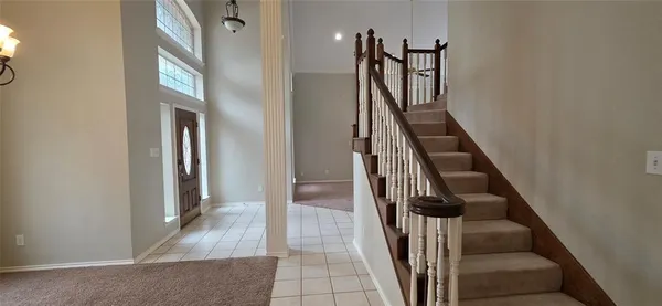 a view of a hallway with entryway