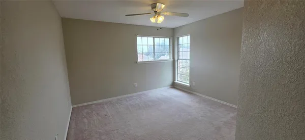 an empty room that has a window