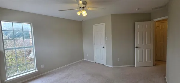 a view of empty room with a window