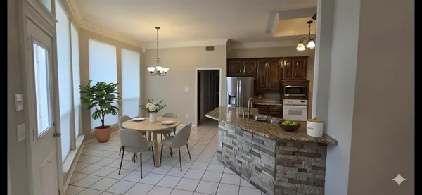 a dining room with furniture