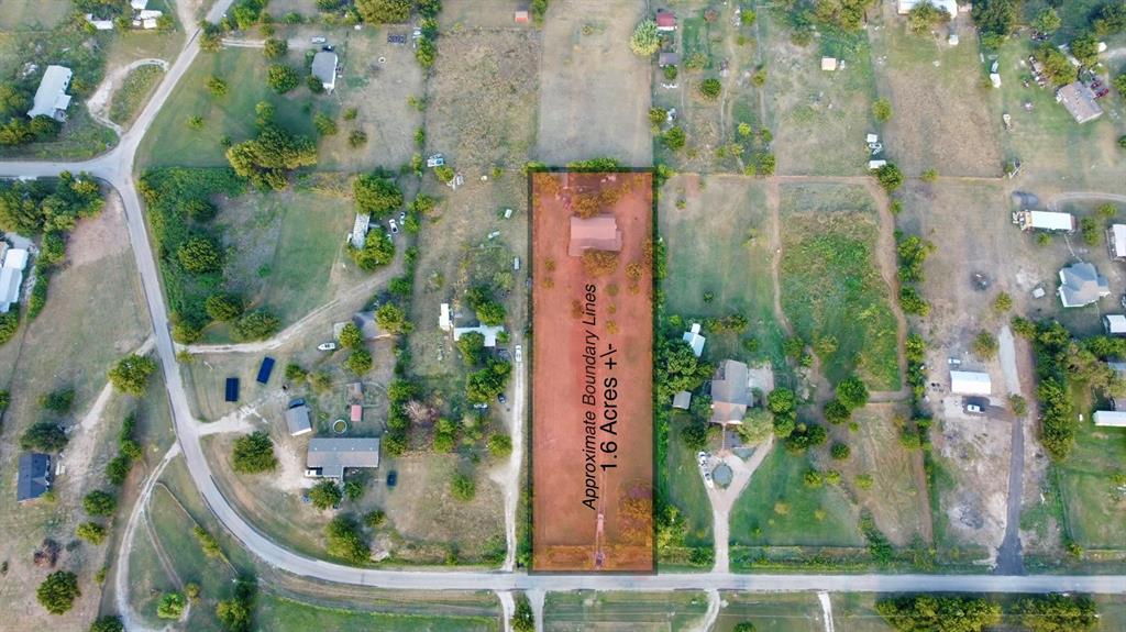 9620 Valley Road Joshua, TX 76058 - Photo 2 of 11 front view of house with a garden