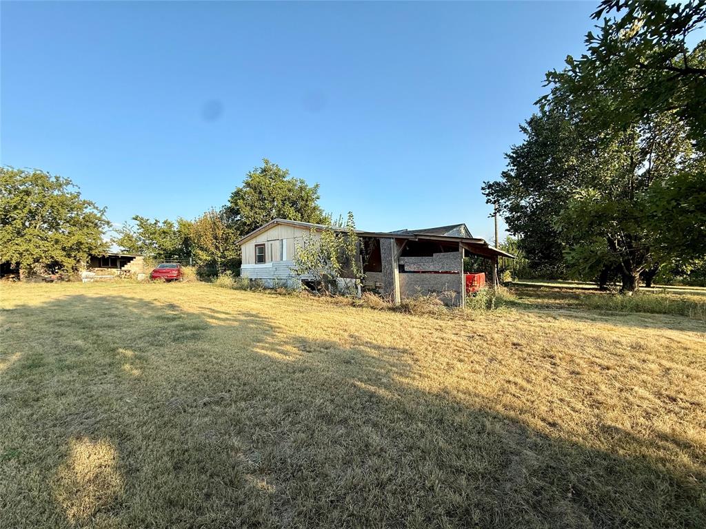 9620 Valley Road Joshua, TX 76058 - Photo 5 of 11 a house view with a outdoor space