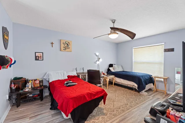 a bathroom with a bathtub sink and mirror