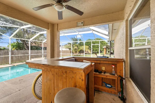 a room with window and chandelier