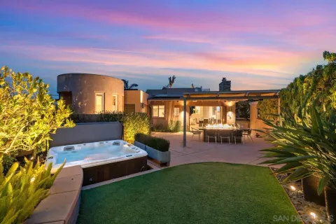 a view of house with patio outdoor seating