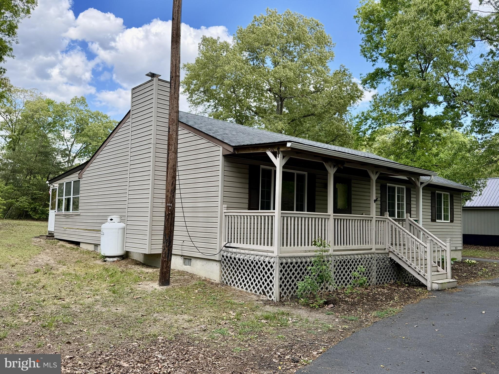25910 Fox Grape Road Greensboro, MD 21639 - Photo 2 of 27 a front view of a house with a yard