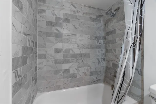 a bathroom with a bathtub