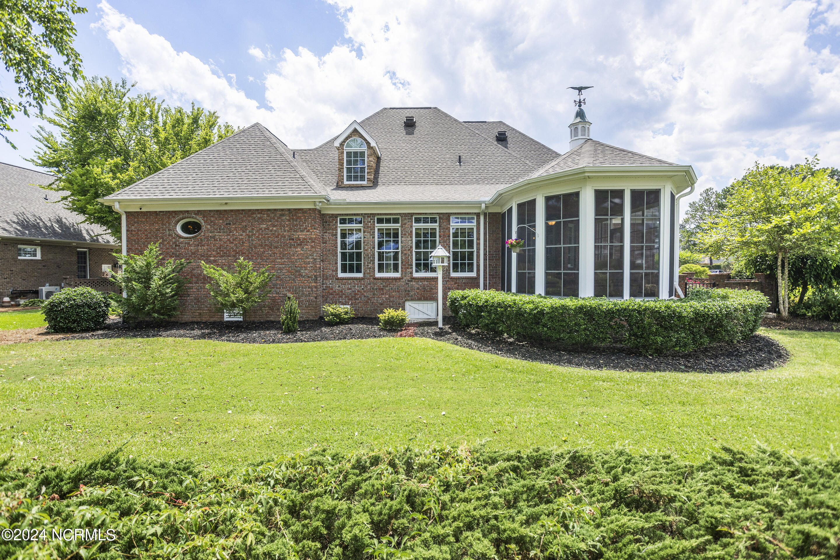 9266 Checkerberry Square Calabash, NC 28467 - Photo 30 of 46 Rear view