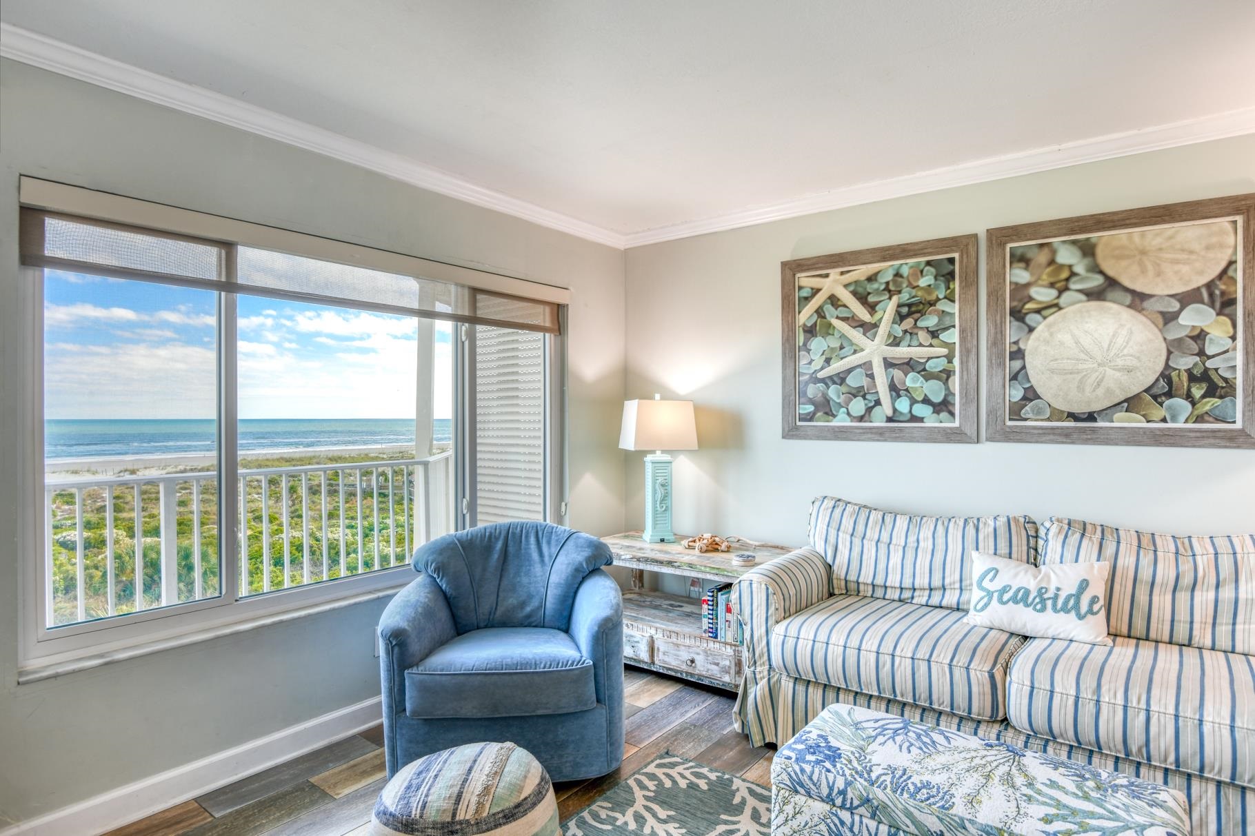 4670 A1A South, Unit 1402 St. Augustine, FL 32080 - Photo 9 of 47 a living room with furniture and a large window
