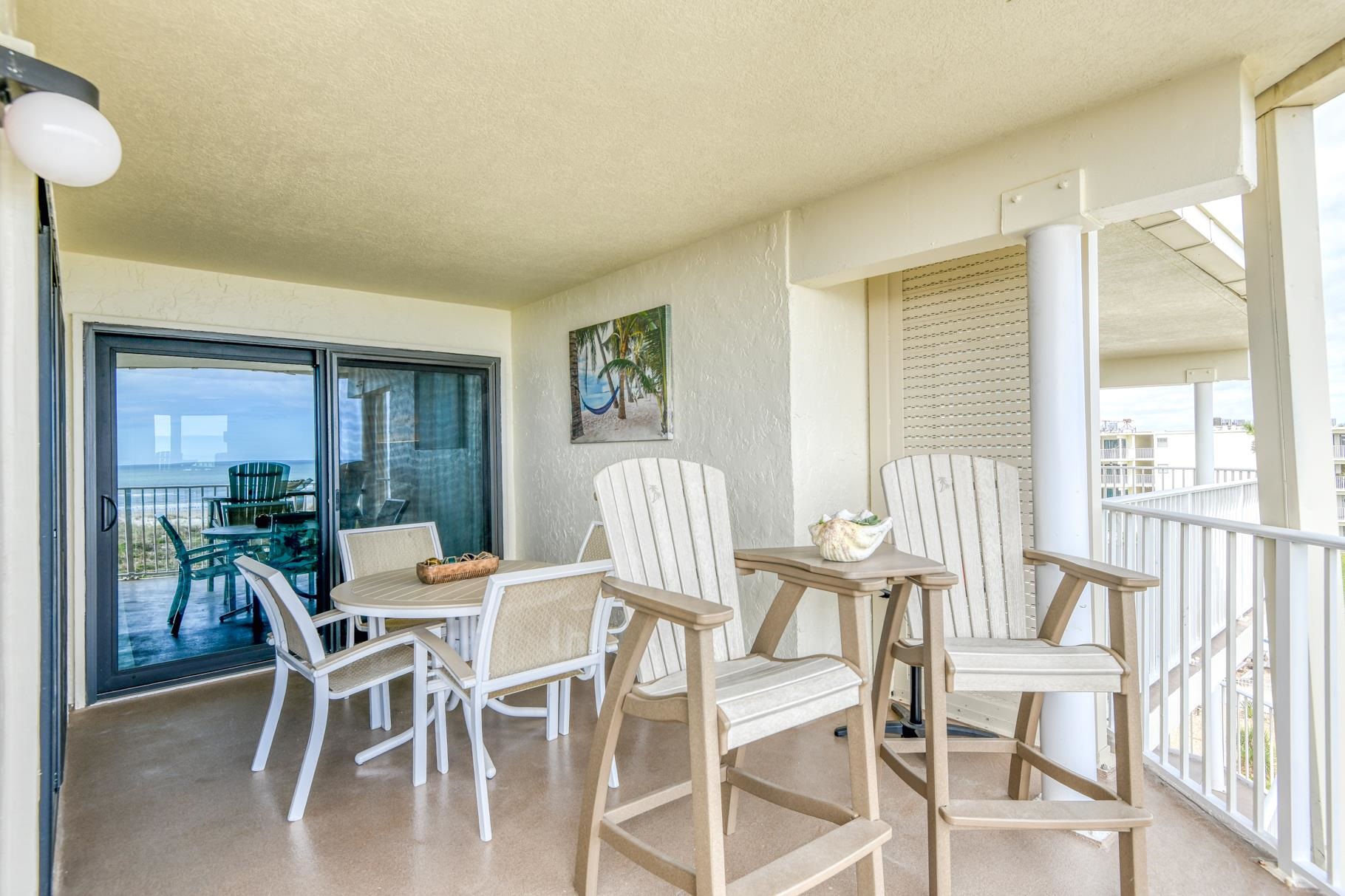 4670 A1A South, Unit 1402 St. Augustine, FL 32080 - Photo 17 of 47 a view of a dining room with furniture window and outside view