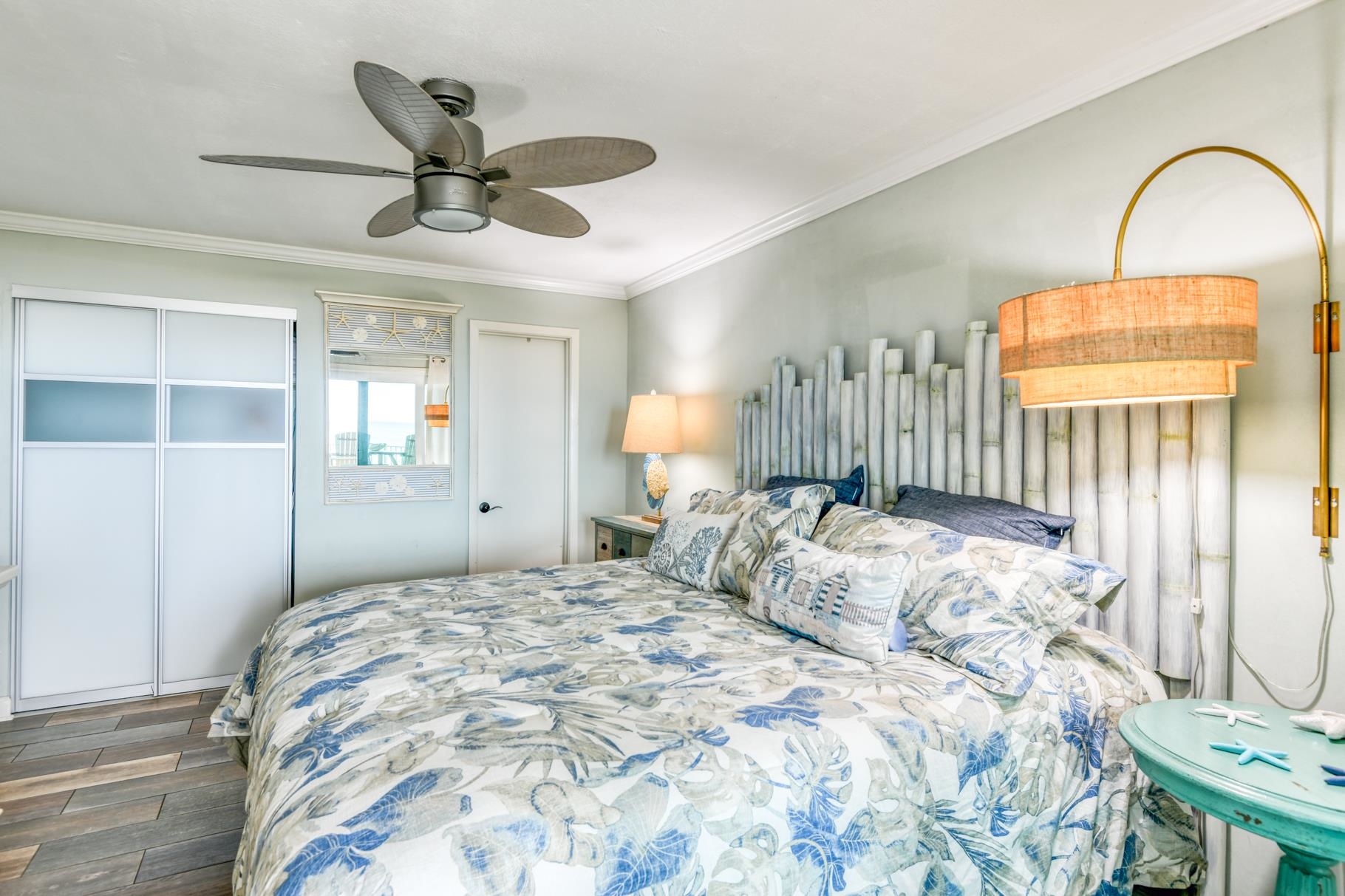 4670 A1A South, Unit 1402 St. Augustine, FL 32080 - Photo 20 of 47 a bedroom with a bed and a painting on the wall