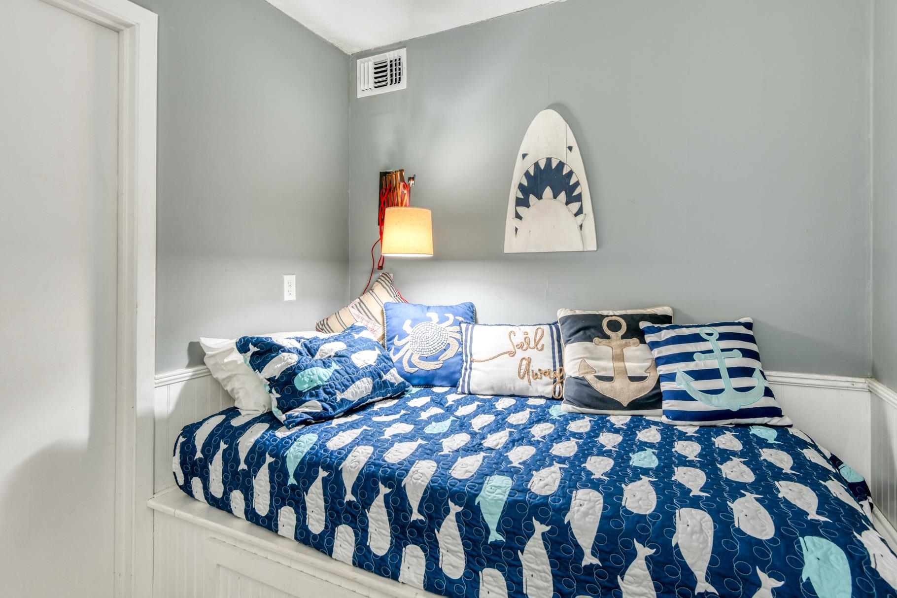 4670 A1A South, Unit 1402 St. Augustine, FL 32080 - Photo 27 of 47 a bedroom with bed and cupboard