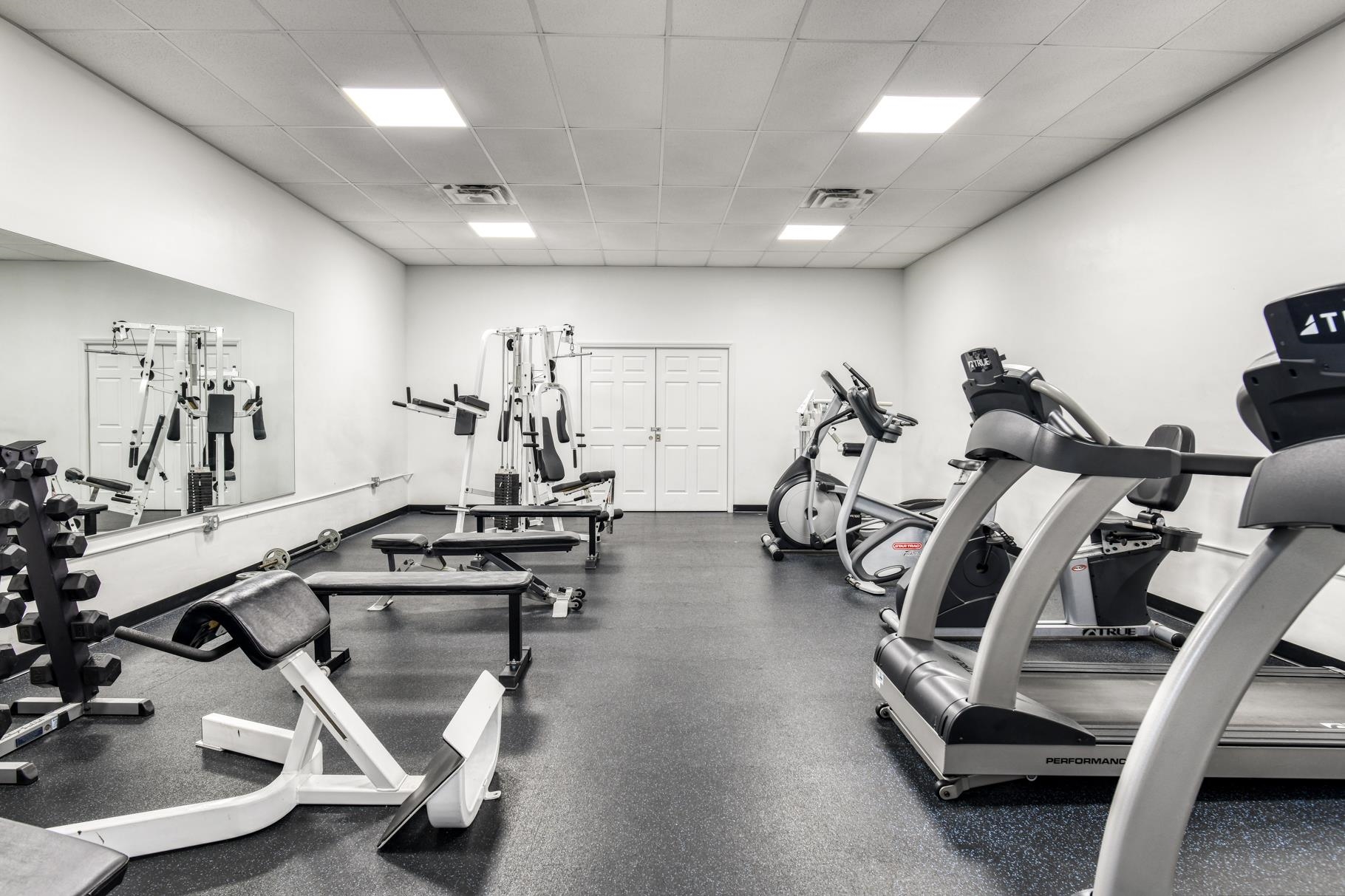 4670 A1A South, Unit 1402 St. Augustine, FL 32080 - Photo 39 of 47 a view of a room with gym equipment
