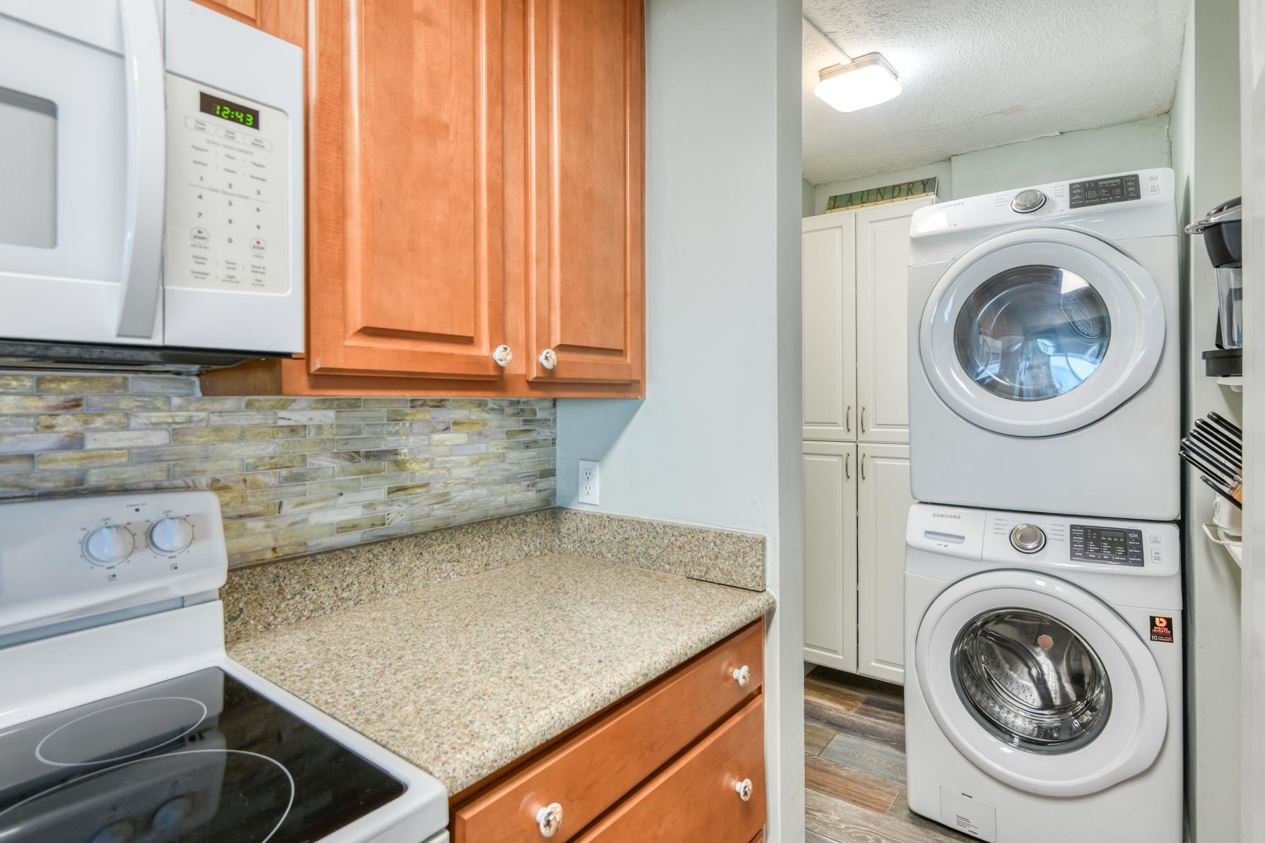 4670 A1A South, Unit 1402 St. Augustine, FL 32080 - Photo 6 of 47 a utility room with dryer and washer