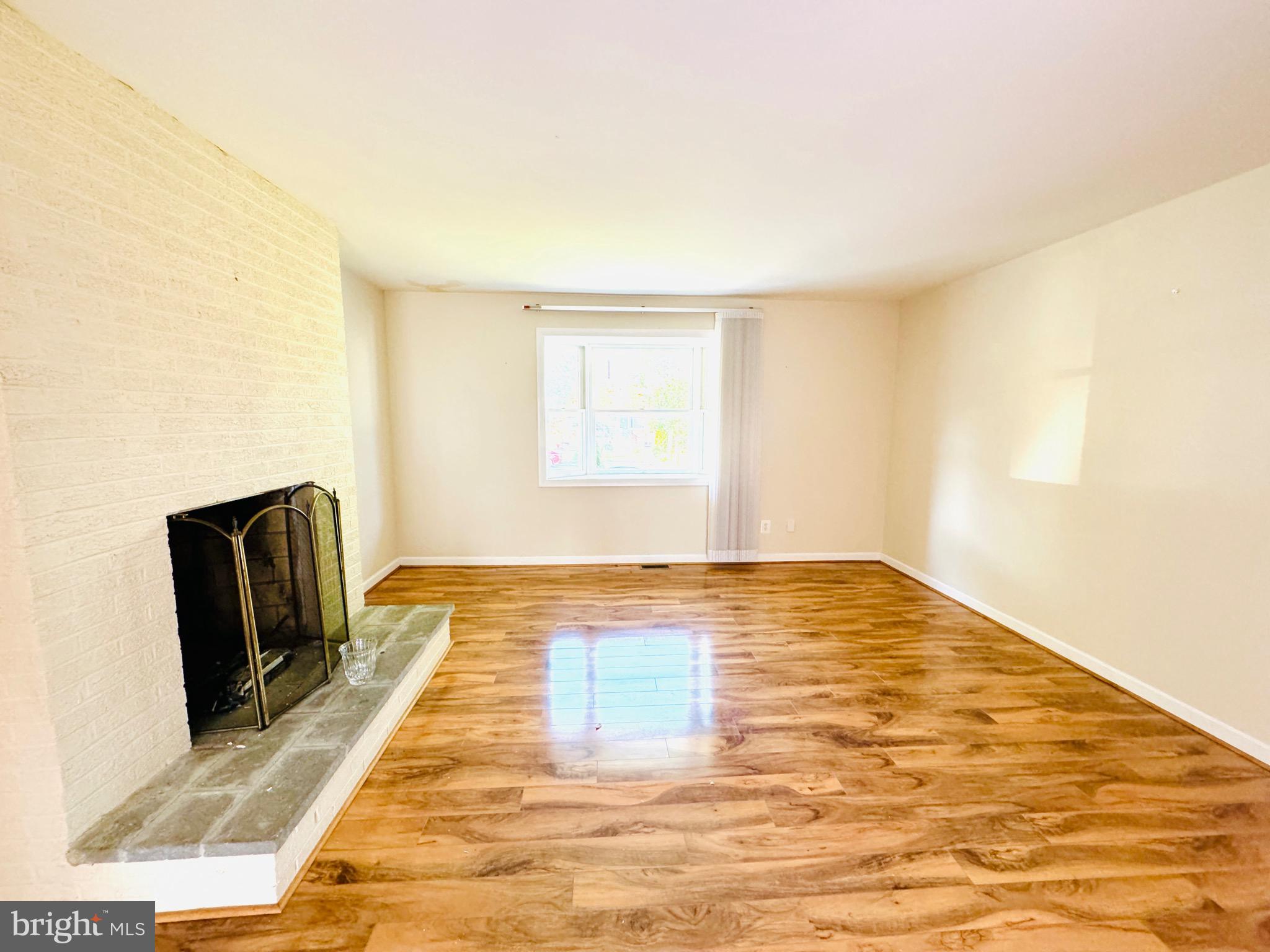 4911 Sargent Road Northeast Washington, DC 20017 - Photo 3 of 29 Living Room with Fireplace