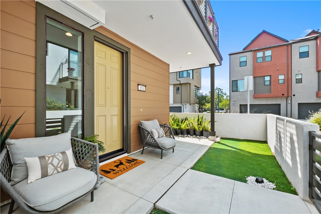 154 Keeper Irvine, CA 92618 - Photo 30 of 42 a balcony with furniture and a table