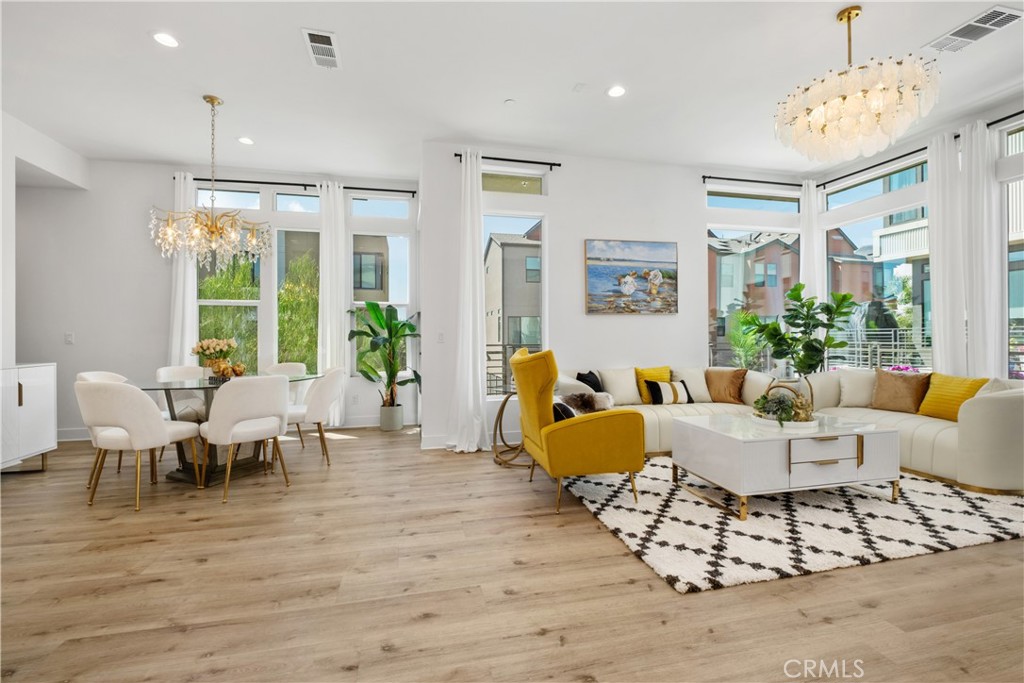 154 Keeper Irvine, CA 92618 - Photo 3 of 42 a living room with furniture large window and wooden floor
