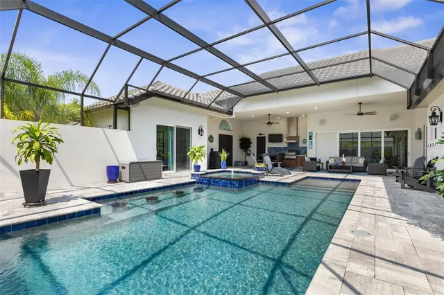 a view of a dinning room with a table and chairs