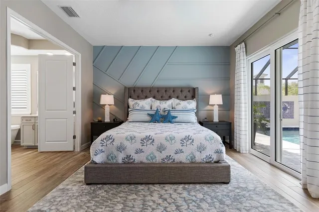 a view of a livingroom with workspace and a window